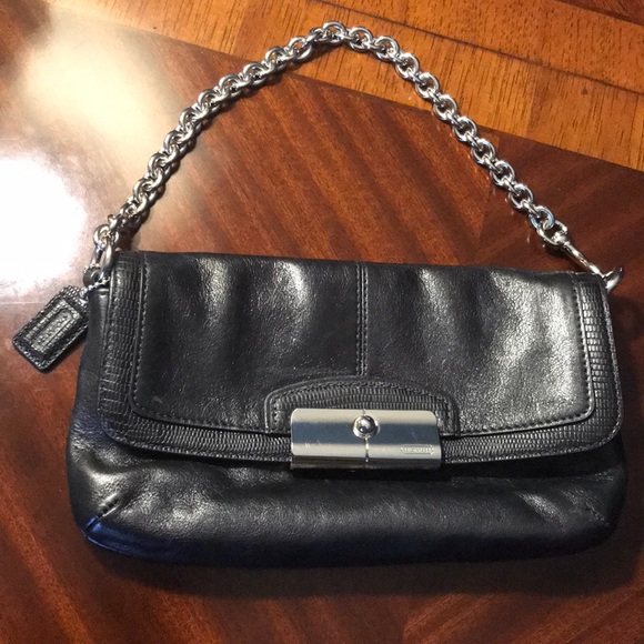 Coach Handbags - Coach black leather wristlet with silver chain
